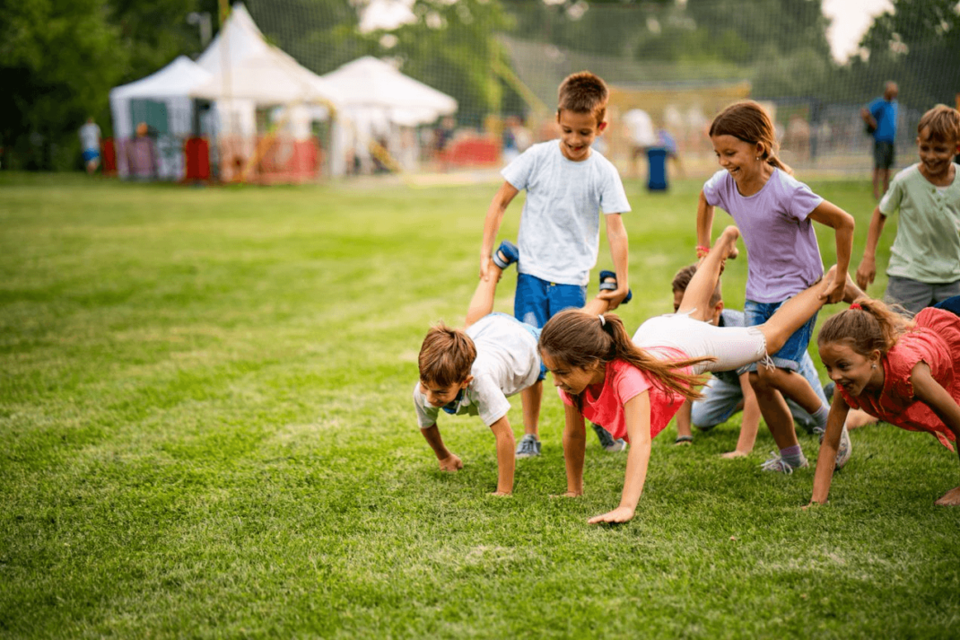 Kids playing in field.