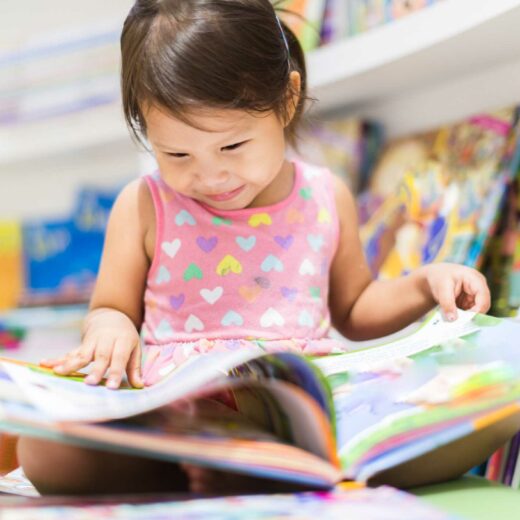 Little Girl Reading Book.